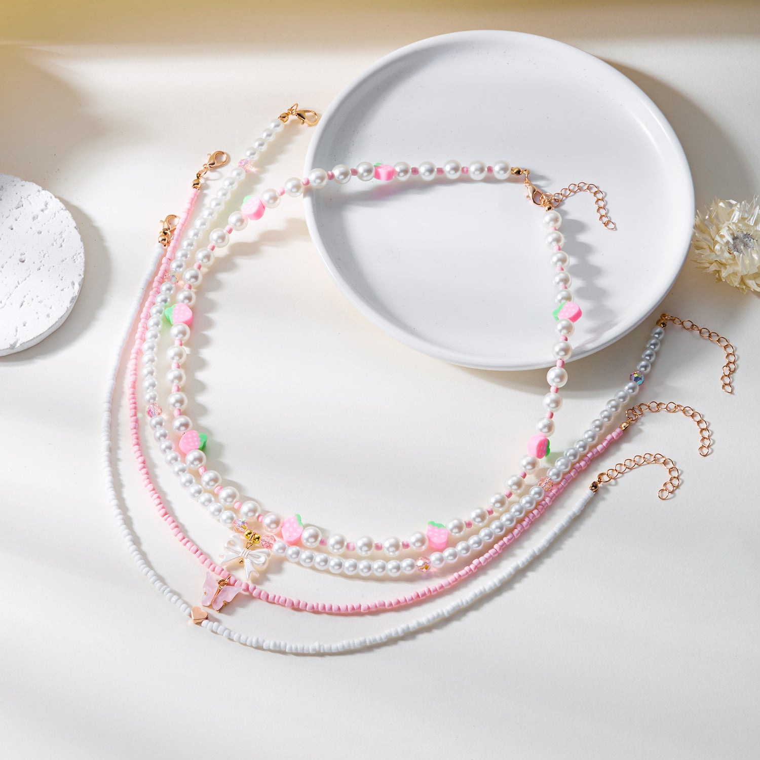 Wholesale Strawberry necklace simple summer small fresh soft ceramic rice pearl necklace female